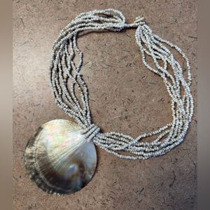 Elegant Cream Beaded Necklace with Shell Pendant